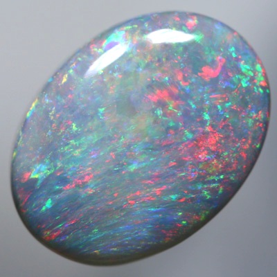 SOLID SEMI BLACK OPAL Sparkles of bright red over green SEE VIDEO